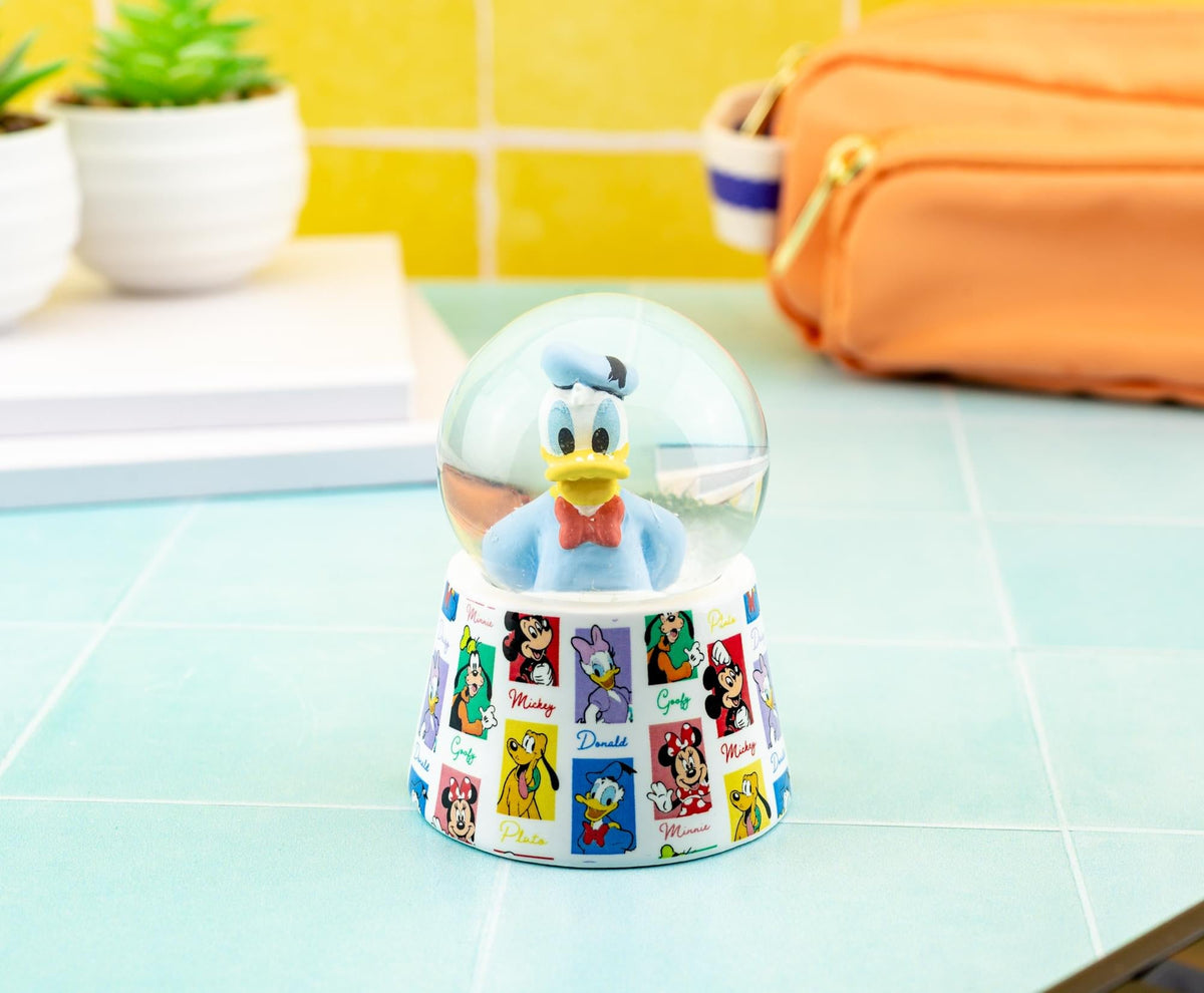 Disney Donald Duck 3-Inch Mini Light-Up Snow Globe
